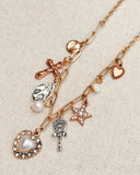 Gold Heart & Star Charm Necklace with Pearl