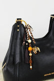 Golden Carousel Bag Charm – Elegant Multi-Functional Pendant