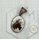 Copper metal oval cowboy pendent: COWBOY